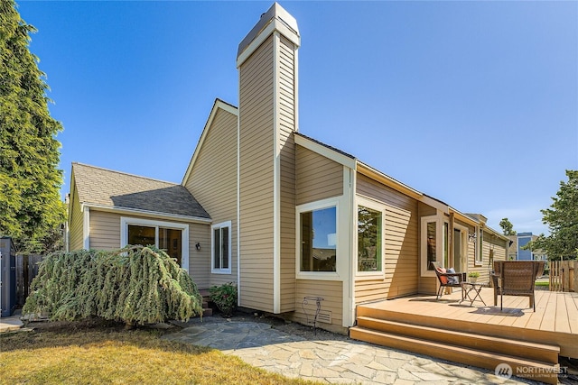 31451 48th Pl SW, Federal Way, WA 98023 - rear view of house featuring a chimney and a wooden deck
