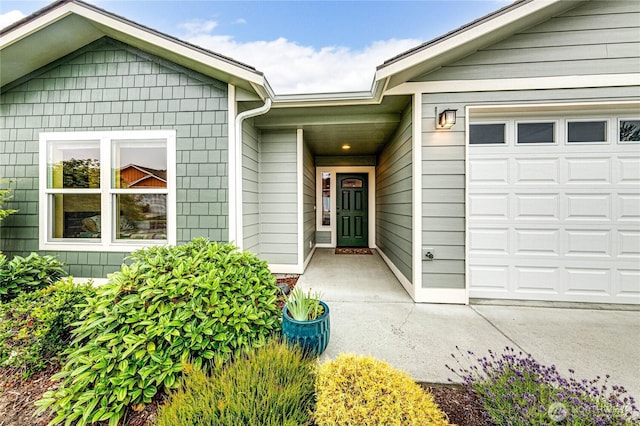 31 Nimbus Ln, Sequim, WA 98382 - property entrance featuring an attached garage