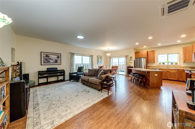 31 Nimbus Ln, Sequim, WA 98382 - living area with healthy amount of natural light, wood finished floors, and recessed lighting