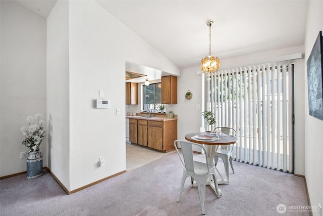 2528 S 363rd St, Federal Way, WA 98003 - dining space with vaulted ceiling, a chandelier, and light carpet