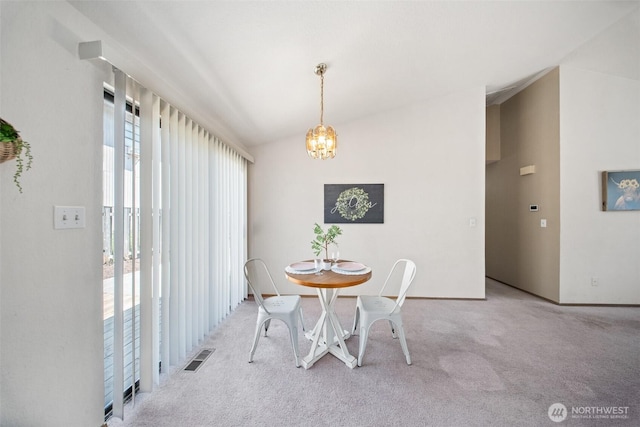 2528 S 363rd St, Federal Way, WA 98003 - dining room featuring a chandelier, carpet flooring, and vaulted ceiling