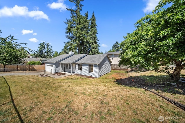 2528 S 363rd St, Federal Way, WA 98003 - view of front facade with concrete driveway, an attached garage, and a chimney