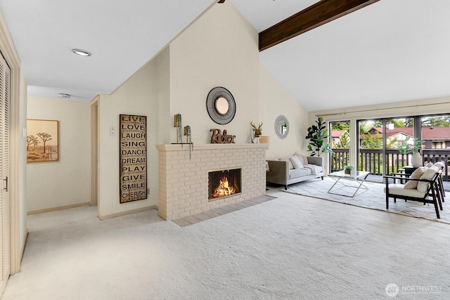 1541 NE 143rd St Unit H5, Seattle, WA 98125 - carpeted living room featuring a brick fireplace, beam ceiling, and high vaulted ceiling