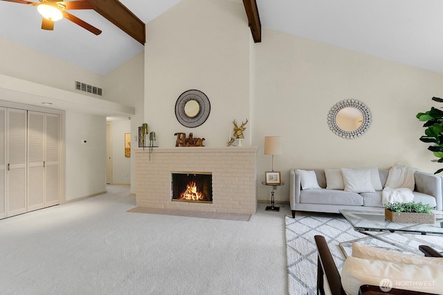 1541 NE 143rd St Unit H5, Seattle, WA 98125 - carpeted living room featuring beamed ceiling, high vaulted ceiling, a brick fireplace, and a ceiling fan