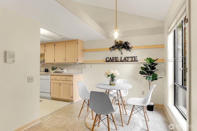 1541 NE 143rd St Unit H5, Seattle, WA 98125 - dining area featuring lofted ceiling and baseboards
