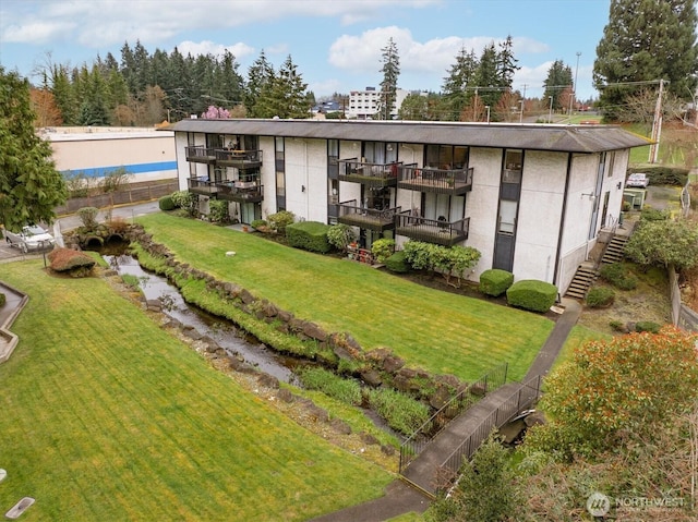 19411 56th Ave W Unit 321, Lynnwood, WA 98036 - view of building exterior featuring stairs