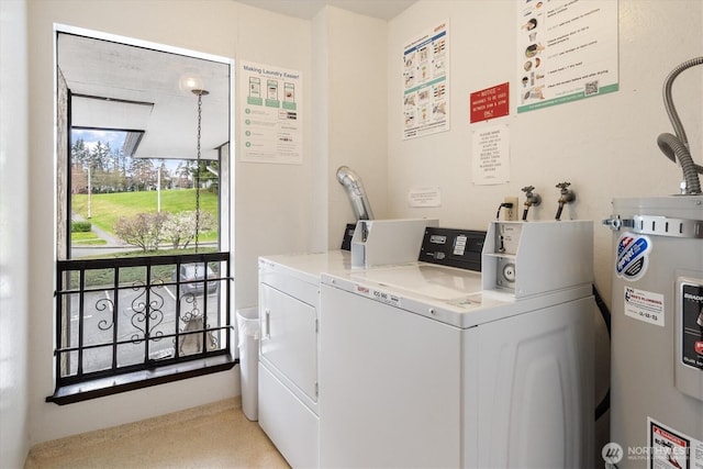 19411 56th Ave W Unit 321, Lynnwood, WA 98036 - community laundry room featuring water heater and washing machine and clothes dryer