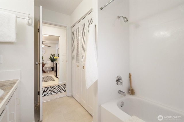 19411 56th Ave W Unit 321, Lynnwood, WA 98036 - full bathroom with vanity, shower / washtub combination, a closet, tile patterned floors, and a ceiling fan