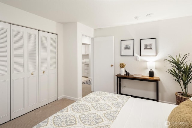 19411 56th Ave W Unit 321, Lynnwood, WA 98036 - bedroom featuring light colored carpet and a closet