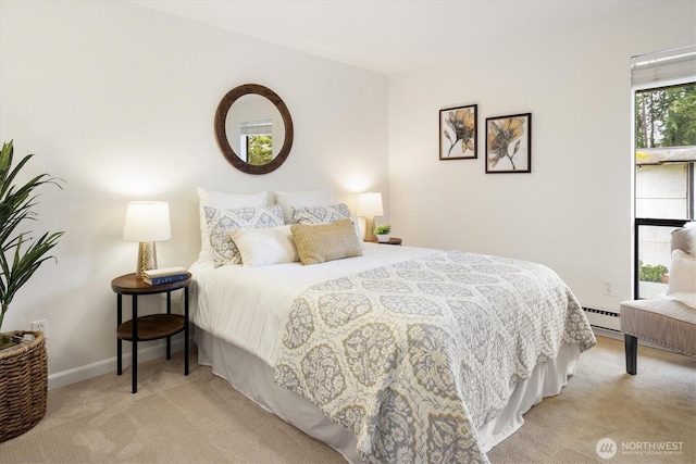 19411 56th Ave W Unit 321, Lynnwood, WA 98036 - bedroom featuring light colored carpet and a baseboard heating unit