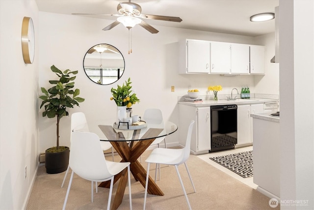 19411 56th Ave W Unit 321, Lynnwood, WA 98036 - dining space featuring a ceiling fan and light colored carpet