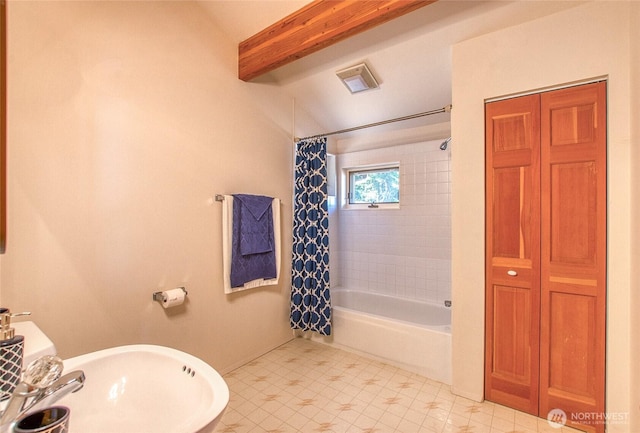 1669 Day Lake Rd, Orcas Island, WA 98245 - bathroom featuring shower / bath combo with shower curtain, a closet, and beamed ceiling
