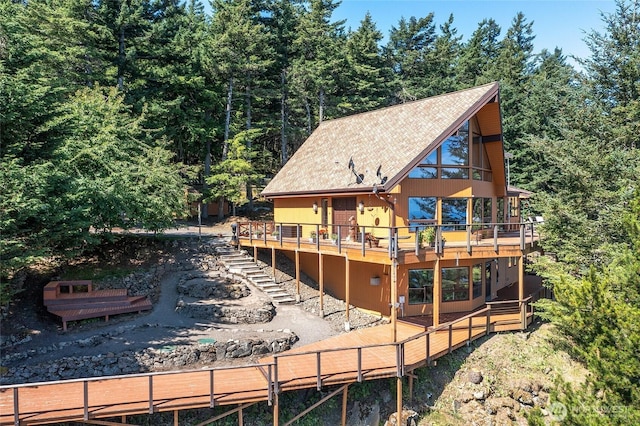 1669 Day Lake Rd, Orcas Island, WA 98245 - back of house featuring a wooden deck and a wooded view