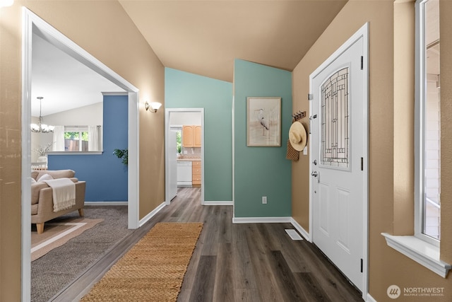 490 E Mountain View Dr, Allyn, WA 98524 - entryway with lofted ceiling, a chandelier, and dark wood-type flooring