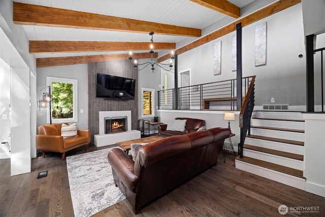 13 Westbrook Ct, Bellingham, WA 98229 - living room with wood finished floors, stairway, a large fireplace, and a chandelier