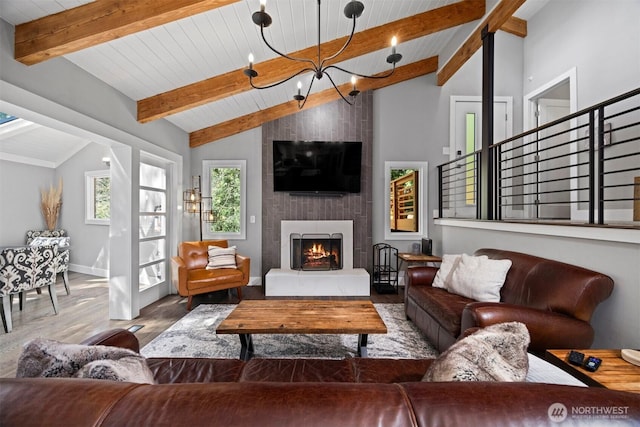 13 Westbrook Ct, Bellingham, WA 98229 - living area featuring a chandelier, wood finished floors, a fireplace, wood ceiling, and stairs
