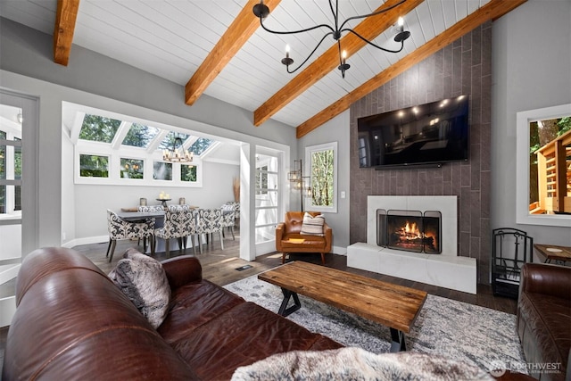 13 Westbrook Ct, Bellingham, WA 98229 - living area featuring a fireplace, wood finished floors, a chandelier, and wood ceiling