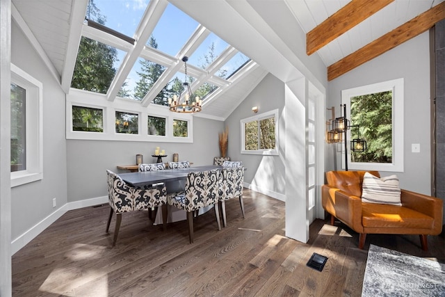 13 Westbrook Ct, Bellingham, WA 98229 - dining area featuring a chandelier, wood finished floors, and a skylight