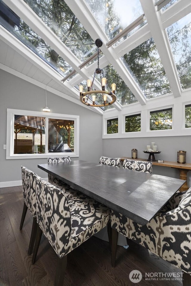 13 Westbrook Ct, Bellingham, WA 98229 - dining area featuring a chandelier, wood finished floors, and a skylight