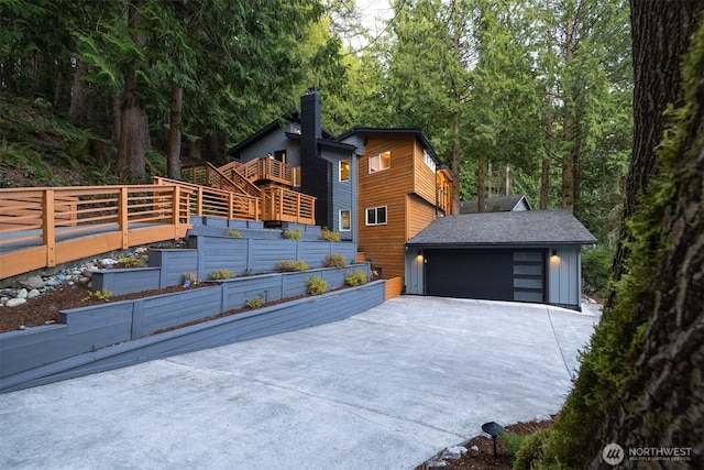 13 Westbrook Ct, Bellingham, WA 98229 - view of front of house with a vegetable garden and a chimney