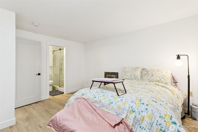 13216 NE 138th Pl, Kirkland, WA 98034 - bedroom featuring wood finished floors and ensuite bath