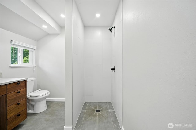 461 NE Lambert Ave, College Place, WA 99324 - bathroom featuring tiled shower, vanity, recessed lighting, and tile patterned flooring