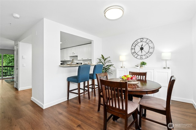23335 Cedar Way Unit B204, Mountlake Terrace, WA 98043 - dining room with dark wood-style floors and baseboards