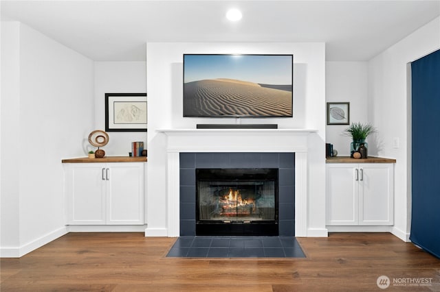 23335 Cedar Way Unit B204, Mountlake Terrace, WA 98043 - detailed view of wood finished floors, a fireplace, and recessed lighting