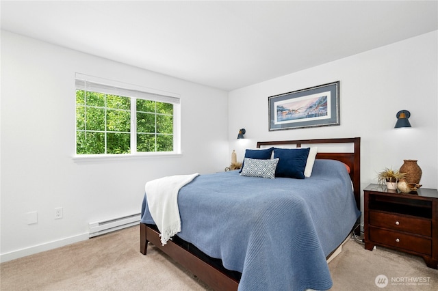 23335 Cedar Way Unit B204, Mountlake Terrace, WA 98043 - bedroom featuring a baseboard heating unit and carpet