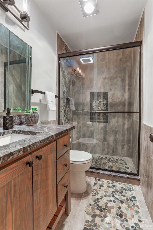 1156 Alki Ave SW Unit 202, Seattle, WA 98116 - bathroom featuring vanity and a shower stall
