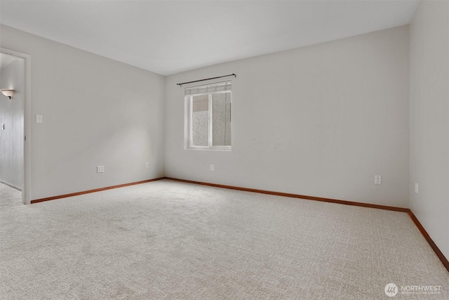 1156 Alki Ave SW Unit 202, Seattle, WA 98116 - carpeted empty room featuring baseboards