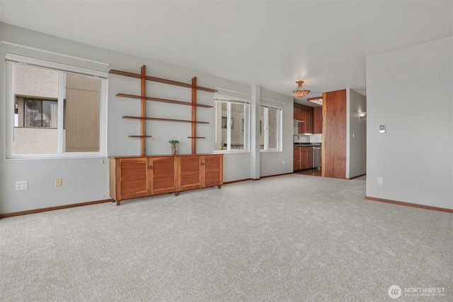 1156 Alki Ave SW Unit 202, Seattle, WA 98116 - unfurnished living room featuring carpet floors