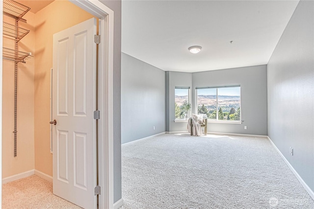 1601 Maiden Ln Unit A102, Wenatchee, WA 98801 - unfurnished bedroom featuring baseboards and carpet floors