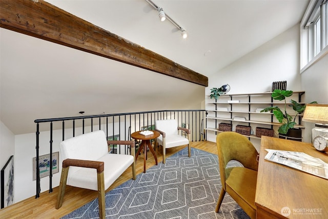 8941 Ravenna Ave NE, Seattle, WA 98115 - sitting room with wood finished floors, vaulted ceiling, and track lighting