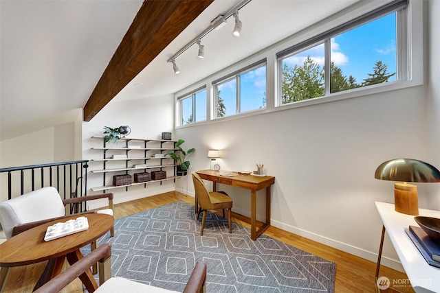 8941 Ravenna Ave NE, Seattle, WA 98115 - living area with a desk, track lighting, and wood finished floors