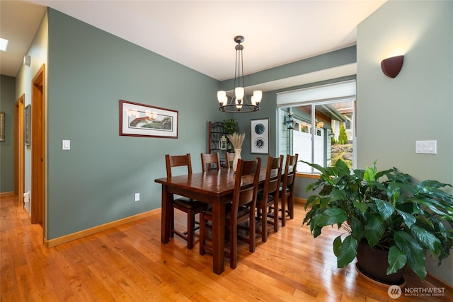 3205 Shelly Hill Rd, Mount Vernon, WA 98274 - dining room with a chandelier and light wood-style floors