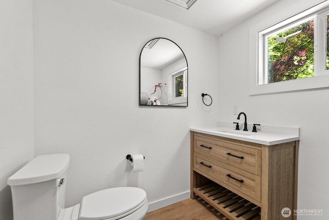 608 NE 2nd St, Winlock, WA 98596 - half bath with vanity and wood finished floors