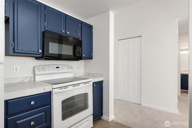10501 8th Ave NE Unit 334, Seattle, WA 98125 - kitchen featuring white range with electric cooktop, black microwave, blue cabinetry, and light countertops