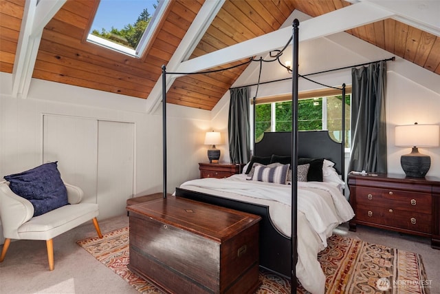 10843 Point Vashon Dr SW, Vashon, WA 98070 - bedroom featuring carpet floors, wooden ceiling, a skylight, and a closet