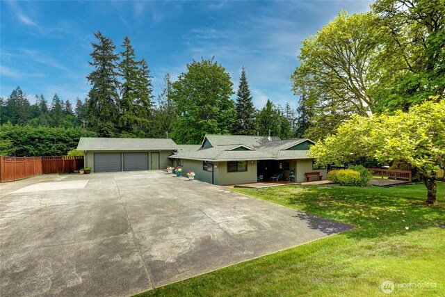 1323 216th Ave NE, Sammamish, WA 98074 - ranch-style house featuring a porch and view of wooded area