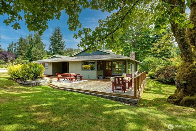 1323 216th Ave NE, Sammamish, WA 98074 - rear view of property featuring a chimney, a deck, and a yard