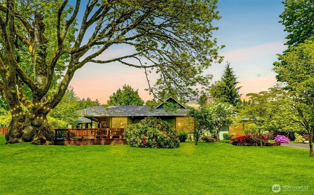 1323 216th Ave NE, Sammamish, WA 98074 - view of green lawn featuring a wooden deck