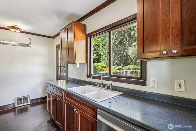 3706 Upland Ave, Everett, WA 98203 - kitchen featuring dark countertops, crown molding, dark wood-style floors, and dishwasher