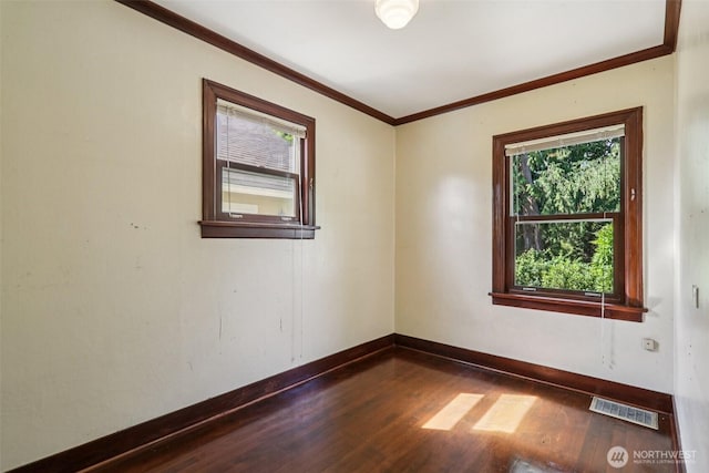 3706 Upland Ave, Everett, WA 98203 - empty room featuring dark wood-style floors and ornamental molding