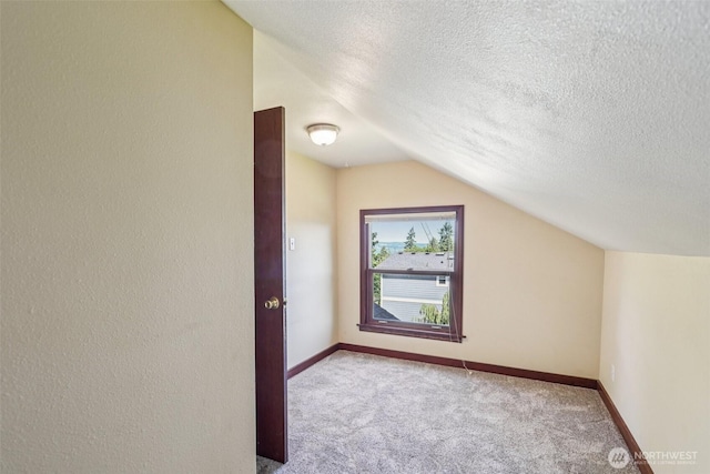 3706 Upland Ave, Everett, WA 98203 - additional living space with lofted ceiling, carpet floors, and a textured ceiling