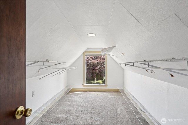 3706 Upland Ave, Everett, WA 98203 - spacious closet featuring vaulted ceiling and carpet flooring