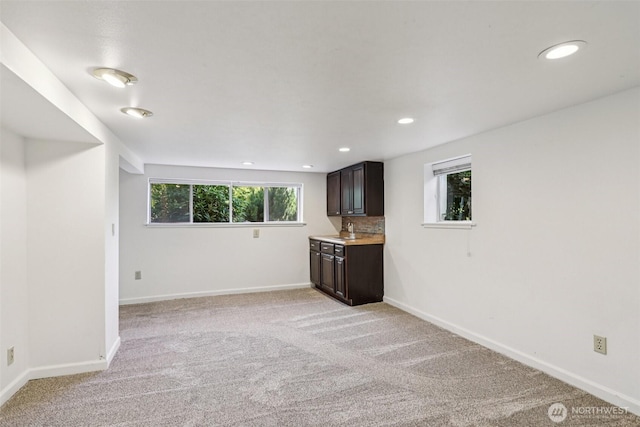 3706 Upland Ave, Everett, WA 98203 - unfurnished living room with light colored carpet and recessed lighting