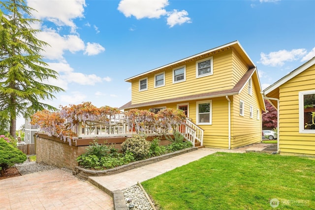 3706 Upland Ave, Everett, WA 98203 - rear view of house featuring a wooden deck and a patio area