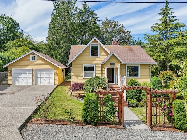 3706 Upland Ave, Everett, WA 98203 - view of front of home with a chimney, a garage, an outdoor structure, and a shingled roof