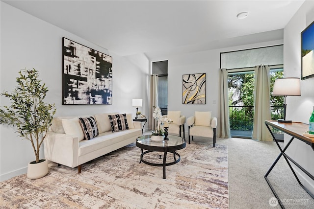 13932 NE 60th St Unit 150, Redmond, WA 98052 - carpeted living area featuring baseboards